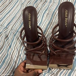 Brown slightly worn 4 inch heels